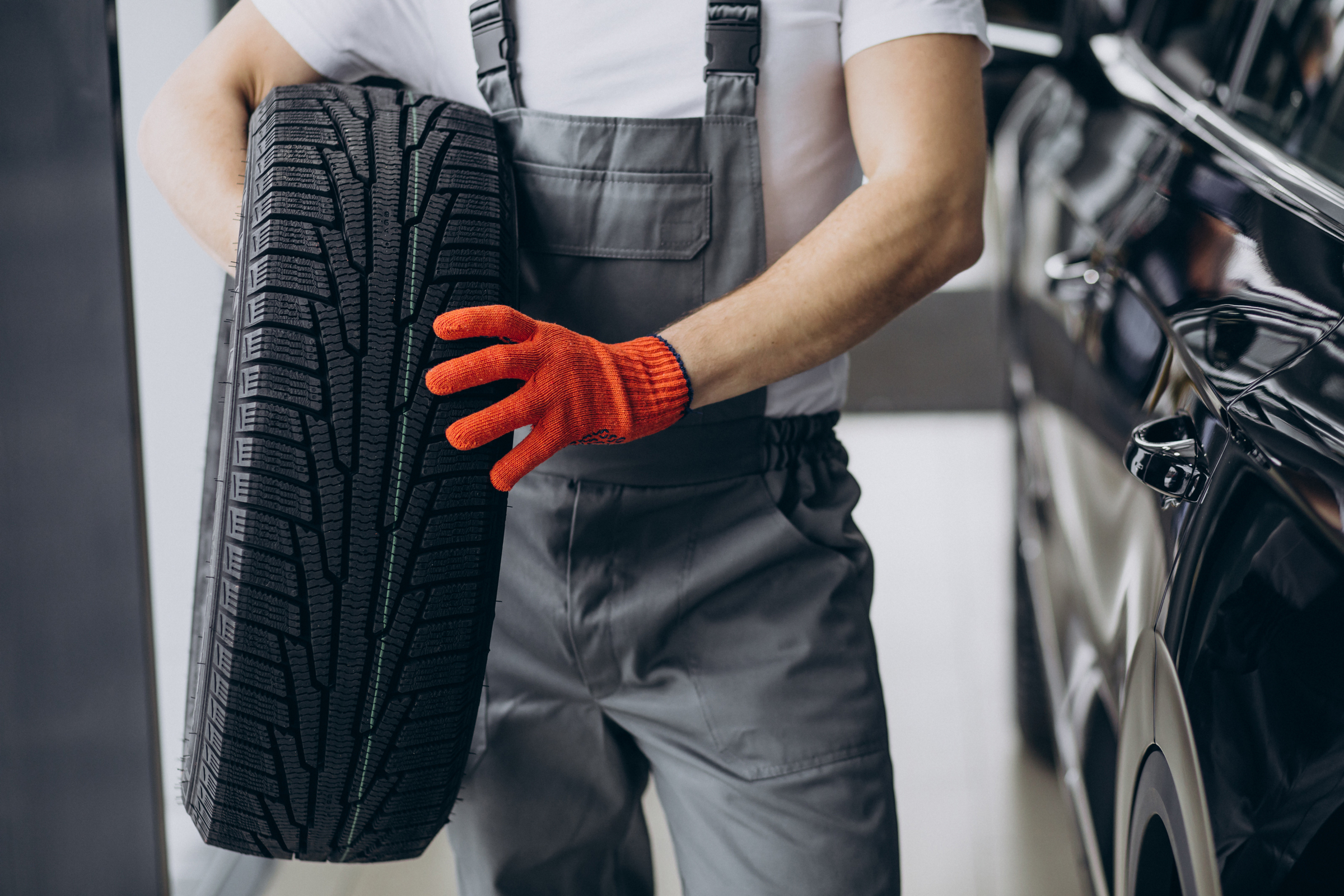 mechanic changing tires car service 2 1